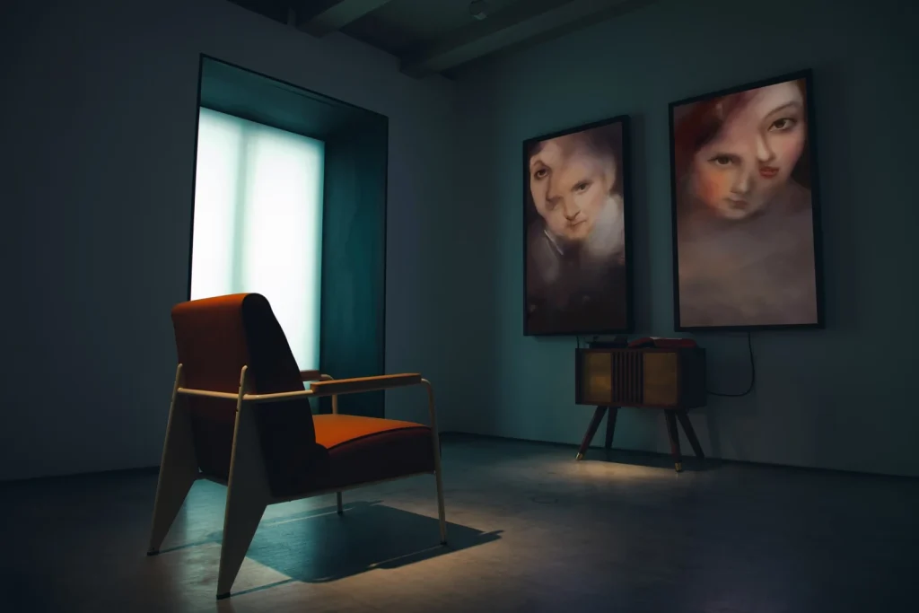 An AI installation in a dark room: a retro wooden console with two screens showing constantly changing, distorted human faces.